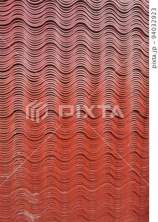 close up of stack red roof tiles close up of stack red roof tiles 94032923