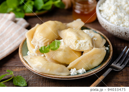 Traiditional Ukrainian Pierogi, Vareniky stuffed with cottage cheese 94033475