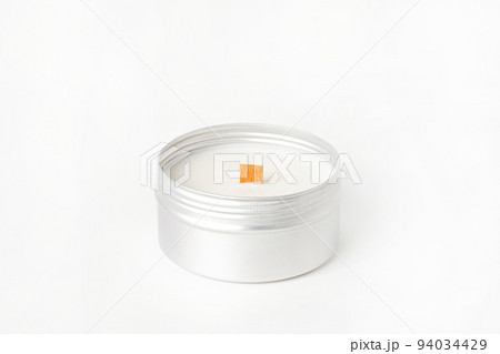 Soy candles in metal cans, handmade modern hobby , harmless coconut wax candles without paraffin on white background isolated 94034429