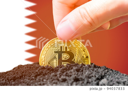 Legalization of bitcoin in Qatar. Planting bitcoin in the ground on the background of the flag of Qatar. Qatar - investment in cryptocurrency Legalization of bitcoin in Qatar. Planting bitcoin in the ground on the background of the flag of Qatar. Qatar - investment in cryptocurrency 94037833