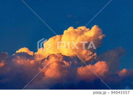 Photography of Beautiful Cumulus Clouds at Sunset - Full frame 94043357