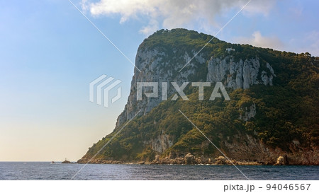 Rocky Coastline with deep blue sea Rocky Coastline with deep blue sea 94046567