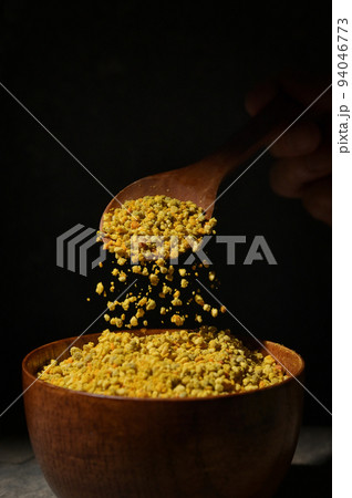 Raw Amorphous Pollen On A Wooden Spoon 94046773