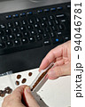Addiction Making A Homemade Cigarette Using Grinded Coffee And Paper 94046781