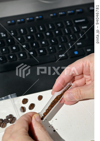 Addiction Making A Homemade Cigarette Using Grinded Coffee And Paper Addiction Making A Homemade Cigarette Using Grinded Coffee And Paper 94046781