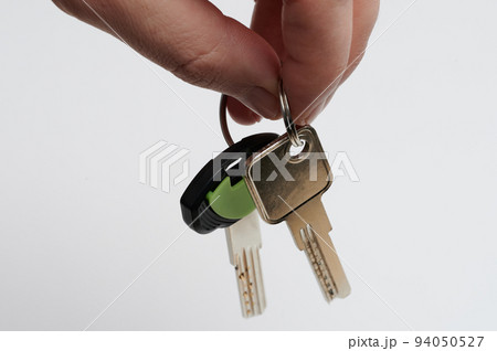 Close up of home keys in hand 94050527