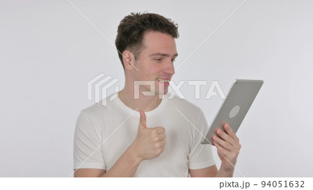 Video Call on Tablet by Young Man on White Background 94051632