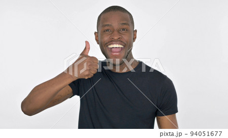 Thumbs Up by Young African Man on White Background Thumbs Up by Young African Man on White Background 94051677
