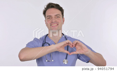 Handmade Heart by Young Doctor on White Background 94051794