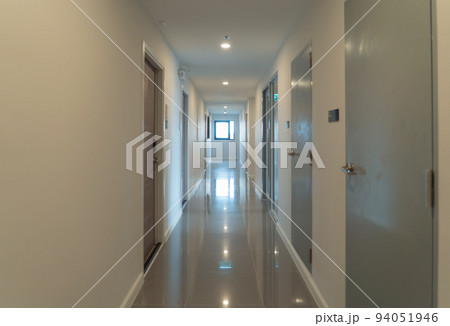 Empty condo, hotel or apartment corridor hall way in condominium building, modern interior design decoration room. Walkway Empty condo, hotel or apartment corridor hall way in condominium building, modern interior design decoration room. Walkway 94051946