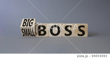 Big vs small boss symbol. Turned wooden cubes with words Small boss and Big boss. Beautiful grey background. Business concept. Copy space. Big vs small boss symbol. Turned wooden cubes with words Small boss and Big boss. Beautiful grey background. Business concept. Copy space. 94054093