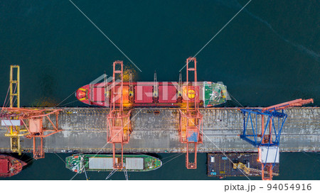 Aerial top view large general cargo ship bulk carrier, Bulk carrier dock, Global business import export logistic and transportation company, Commercial dock container cargo vessel freight shipping 94054916
