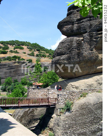Panoramic view from Holy Trinity Monastery of Meteora in Greece high in the mountains. Unusual architecture. 94055232