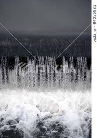 A picture of the flowing water. The dam is designed to regulate the water level in rivers within the city and to provide technical water to industrial objects A picture of the flowing water. The dam is designed to regulate the water level in rivers within the city and to provide technical water to industrial objects 94056981