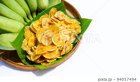 Banana slice chips on white background. 94057494