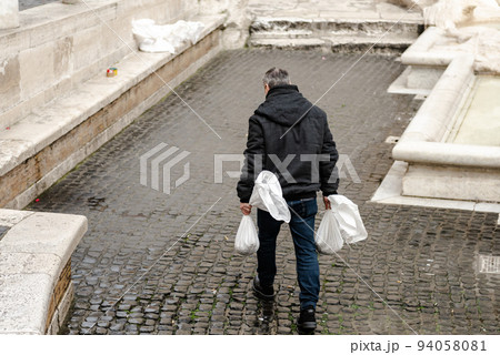 Cleaning the Trevi Fountain from coins. 94058081