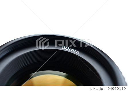 Fragment of a portrait lens for a modern SLR camera. A photograph of a wide-aperture lens with a focal length of 50mm isolated on white Fragment of a portrait lens for a modern SLR camera. A photograph of a wide-aperture lens with a focal length of 50mm isolated on white 94060119