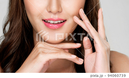Closeup portrait of ardent young girl with healthy skin posing beauty gesture. 94060739