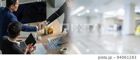 Group business people handshake at meeting table in widen view 94061283
