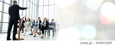 Group of business people meeting in a seminar conference widen view 94061684