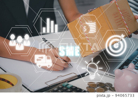 SME, Small and medium-sized enterprises,  Freelance woman  merchant preparing a package box to deliver to customers, Business model, KEY TO SUCCESS concept. 94065733