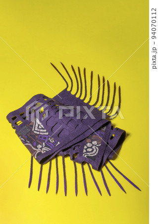 Purple felted wool scarf on a yellow background 94070112