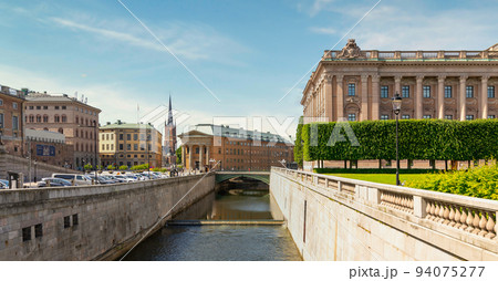 Norrstrom river with Swedish Parliament, Central authority of Sweden, and tower of Klara Church, Gamla Stan, Stockholm Norrstrom river with Swedish Parliament, Central authority of Sweden, and tower of Klara Church, Gamla Stan, Stockholm 94075277