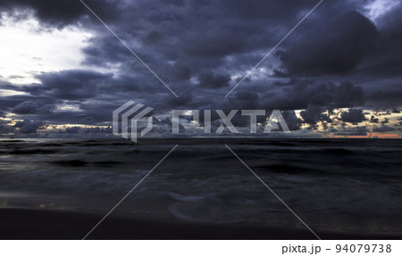 Sunset over Baltic Sea with oil platform Sunset over Baltic Sea with oil platform 94079738