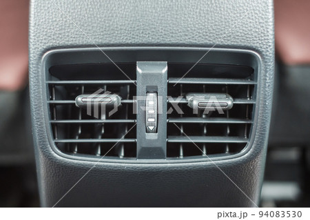 air conditioner cooling system inside the car. Adjust, temperature and transport concept air conditioner cooling system inside the car. Adjust, temperature and transport concept 94083530