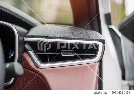 air conditioner cooling system inside the car. Adjust, temperature and transport concept air conditioner cooling system inside the car. Adjust, temperature and transport concept 94083532
