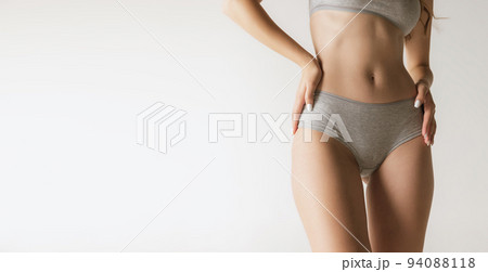 Cropped image of female body posing in cotton - Stock Photo [98534972] -  PIXTA