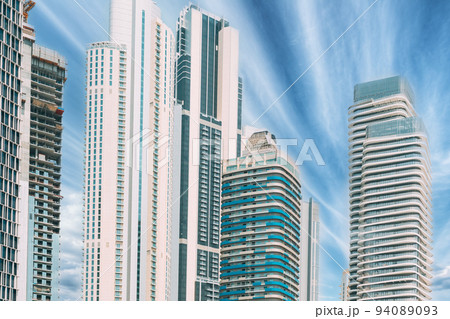 View of high-rise buildings in sunny day. Cityscape Backgrounds View of high-rise buildings in sunny day. Cityscape Backgrounds 94089093