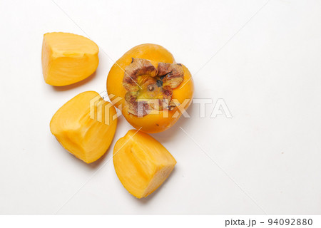 top view of persimmon on white background  94092880