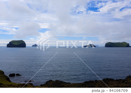 Vestmannaeyjar island beach day view, Iceland landscape.Surtsey island Vestmannaeyjar island beach day view, Iceland landscape.Surtsey island 94106709