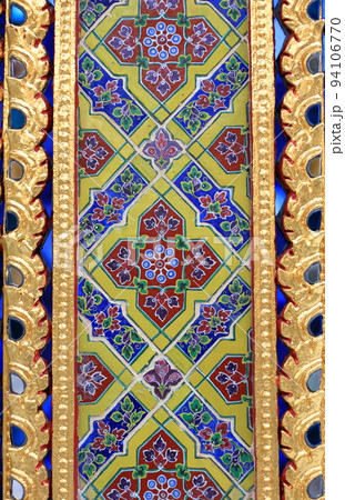 Beautiful detail of traditional Thai art decorated made from ceramic tile and paint, on the wall of building of public Buddhist temple ,textures background. Beautiful detail of traditional Thai art decorated made from ceramic tile and paint, on the wall of building of public Buddhist temple ,textures background. 94106770