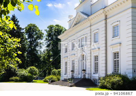Uzutrakis manor. Colonnaded mansion set in landscaped gardens. Trakai, Lithuania, 2 July 2022 Uzutrakis manor. Colonnaded mansion set in landscaped gardens. Trakai, Lithuania, 2 July 2022 94106867