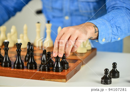 Tactics is knowing what to do. Chess lesson. Strategy concept. Playing chess. Intellectual hobby. Figures on wooden chess board. Thinking about next step. Development logics. Learning play chess 94107281