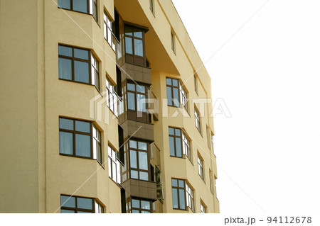 facade of apartment building against the sky facade of apartment building against the sky 94112678