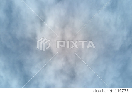 Aerial view from high altitude of earth covered with puffy rainy clouds forming before rainstorm 94116778