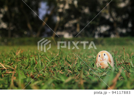 a ovely stone of easter bunny onlawn 94117883