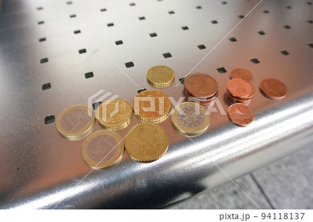 euro coins on the metallic table euro coins on the metallic table 94118137