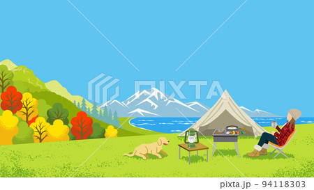 秋キャンプを楽しむ女性と犬 秋キャンプを楽しむ女性と犬 94118303