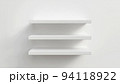 3D rendering. Empty white shop shelf, retail shelf on grey background. 94118922