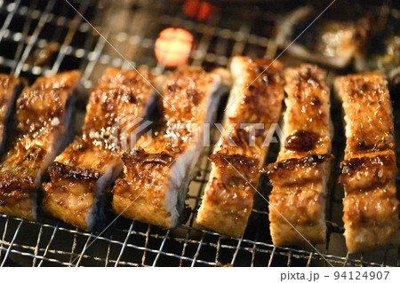 cooking grilled food charcoal fire broiled eels cooking grilled food charcoal fire broiled eels 94124907