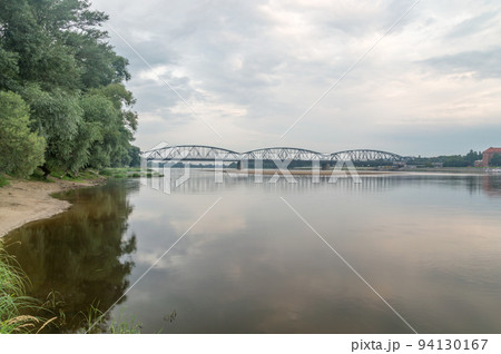Jozef Pilsudski Bridge over Vistula River in the morning in Torun in Poland. 94130167
