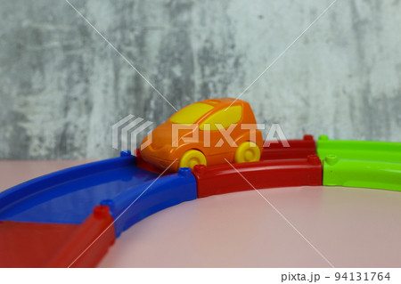 Multi-colored plastic constructor track with cars for children Multi-colored plastic constructor track with cars for children 94131764
