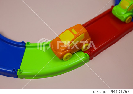 Multi-colored plastic constructor track with cars for children Multi-colored plastic constructor track with cars for children 94131768