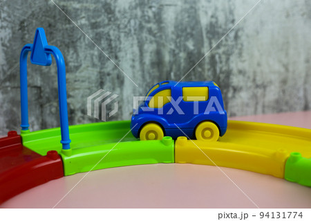 Multi-colored plastic constructor track with cars for children Multi-colored plastic constructor track with cars for children 94131774