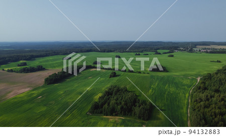 Aerial view of green summer forest and roads. Rural landscape. 94132883