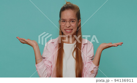 Pretty irritated girl kid raising hands in indignant expression, asking why, what reason of failure 94136911